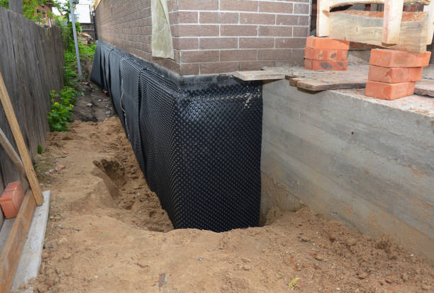 SJ Waterproofing Pros technician performing targeted Waterproofing assessment in Port Reading, NJ